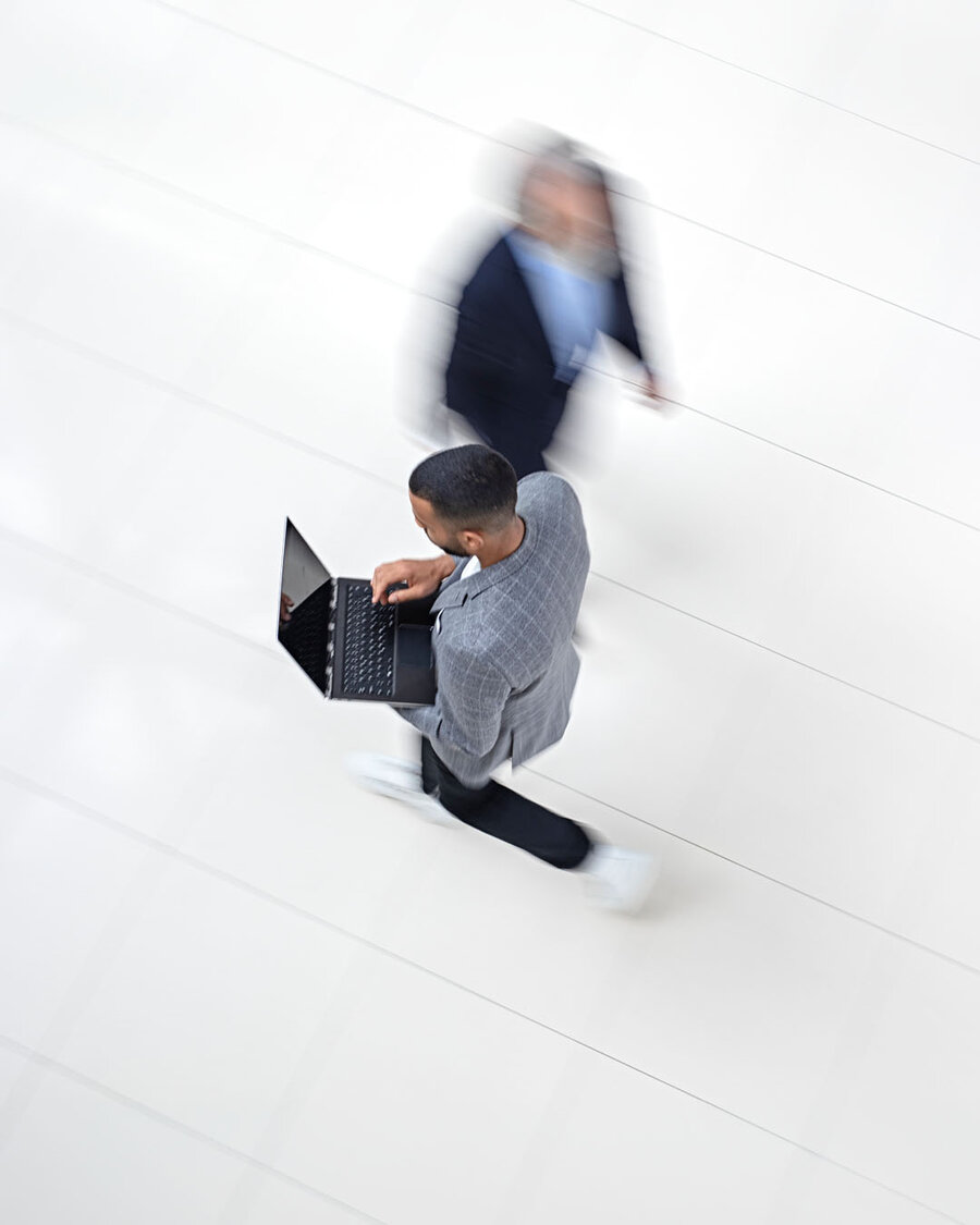 Overhead view of an employee walking through the office