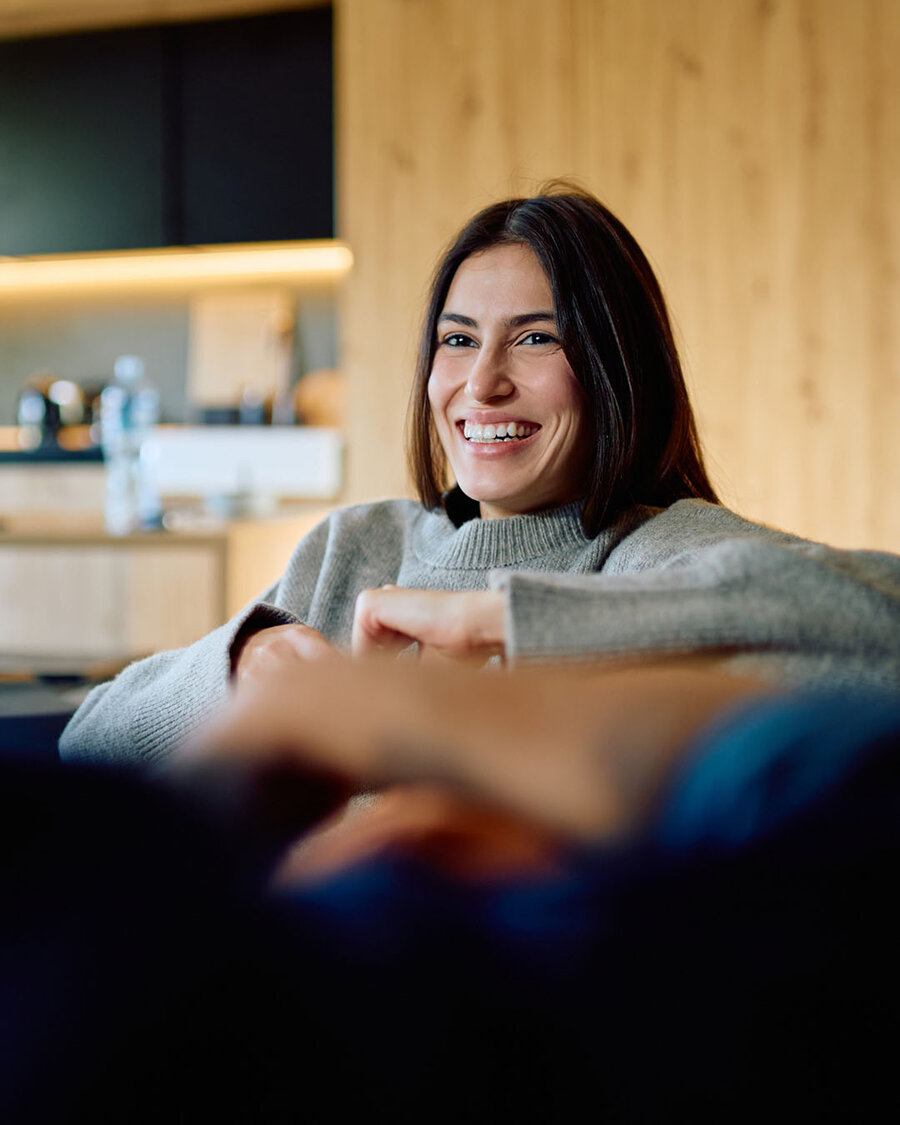 Employee smiling in a break area