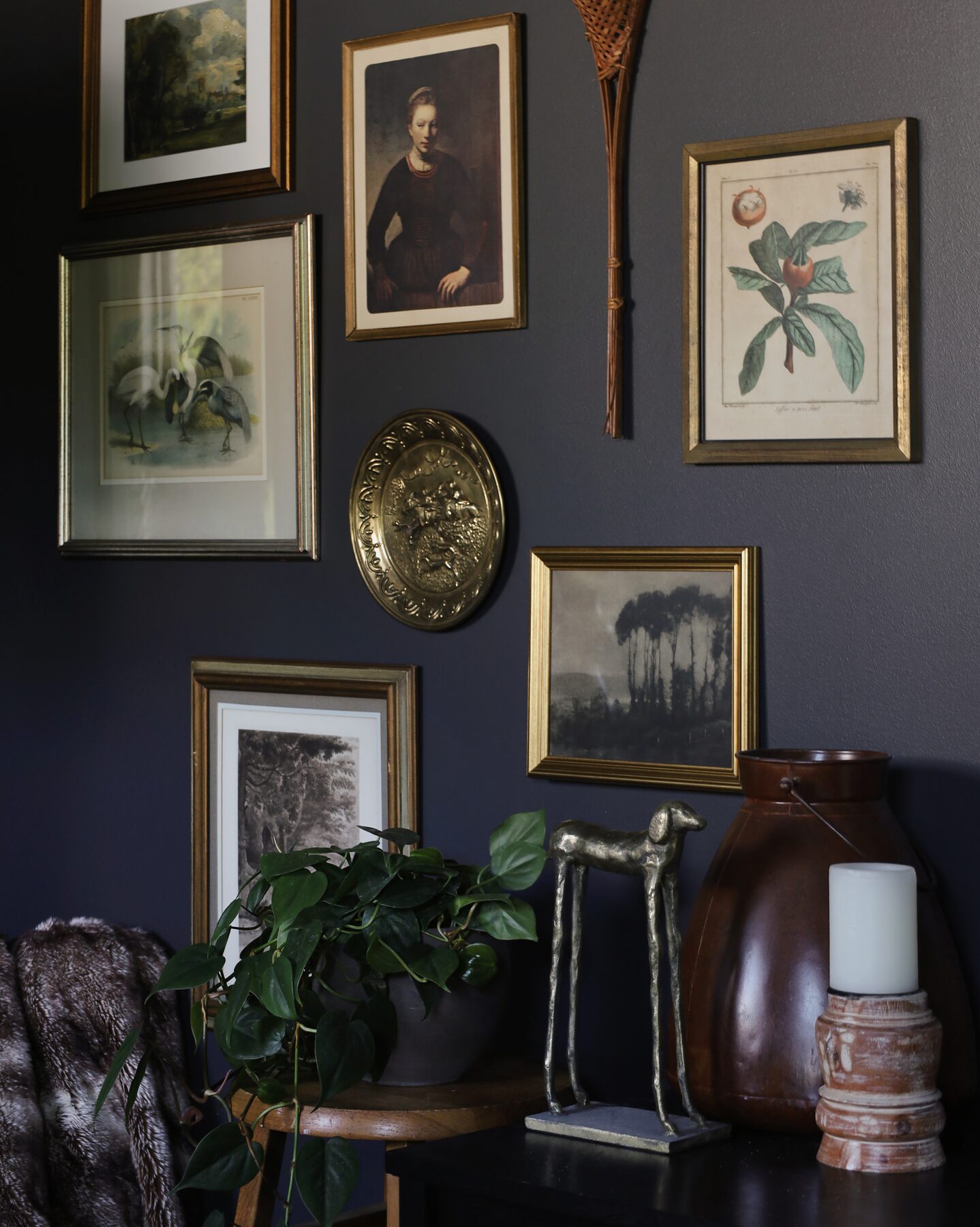 Dark, moody gallery-wall interior photo for the Semimade Home brand